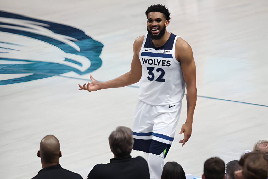 Karl-Anthony Towns #32 of the Minnesota Timberwolves reacts during the fourth quarter against the Dallas Mavericks in Game Four of the Western Conference Finals at American Airlines Center on May 28, 2024 in Dallas, Texas.